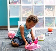 Autistic child engaging in calm sensory play