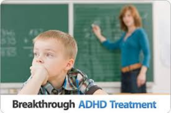 Child with ADHD concentrating in a classroom environment